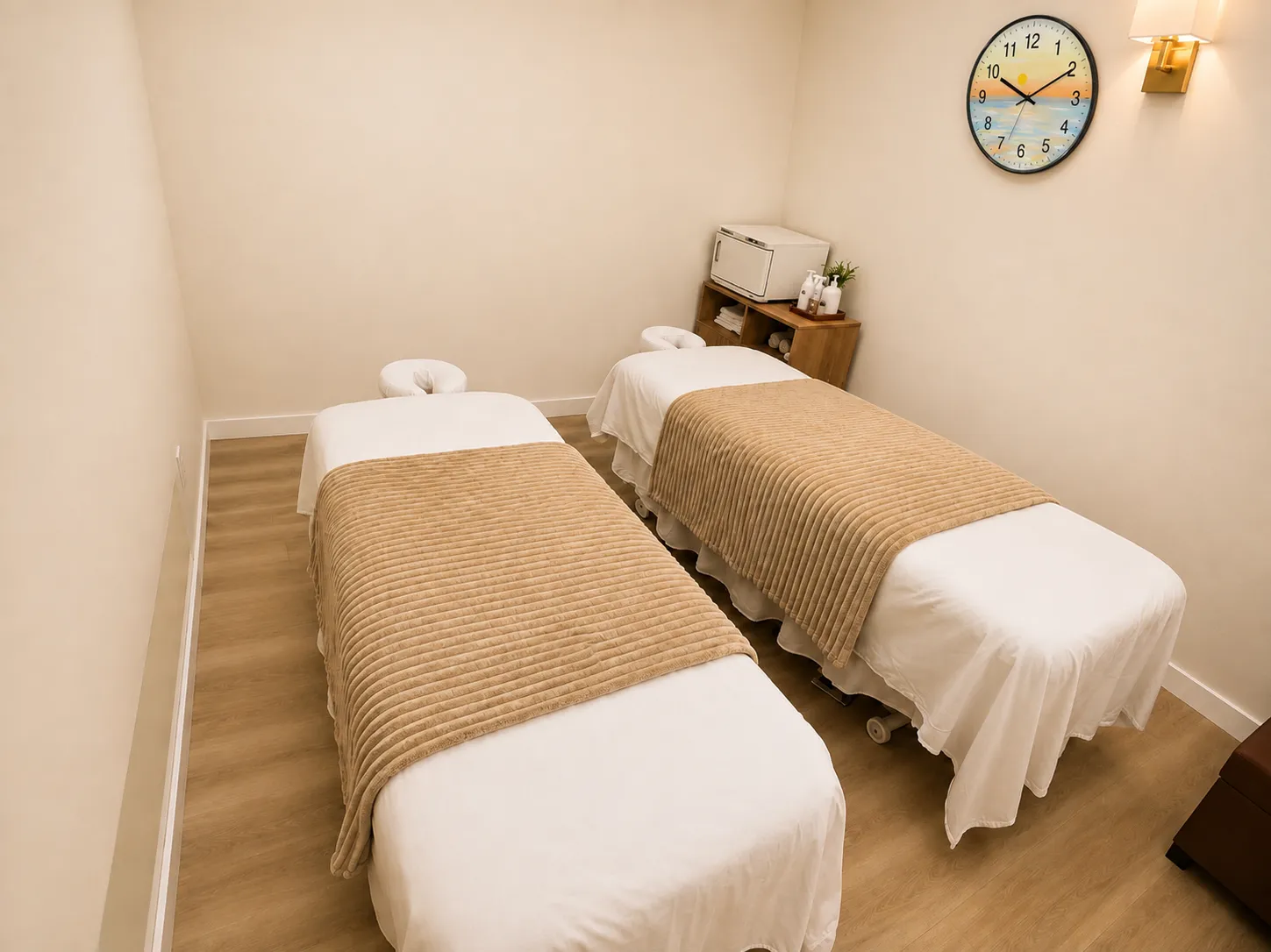 bright twin treatment room with warm blankets